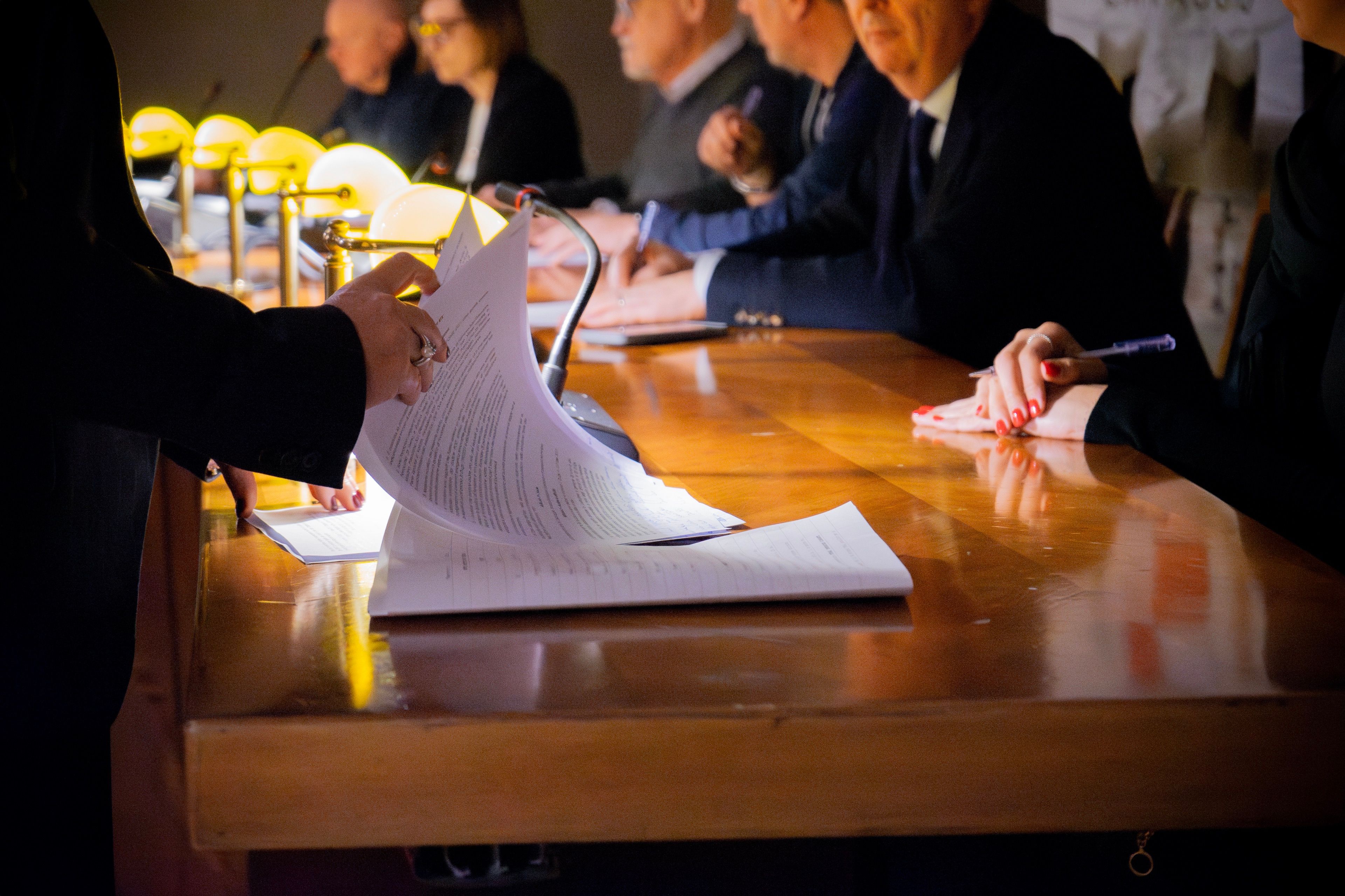 A business meeting around a conference table